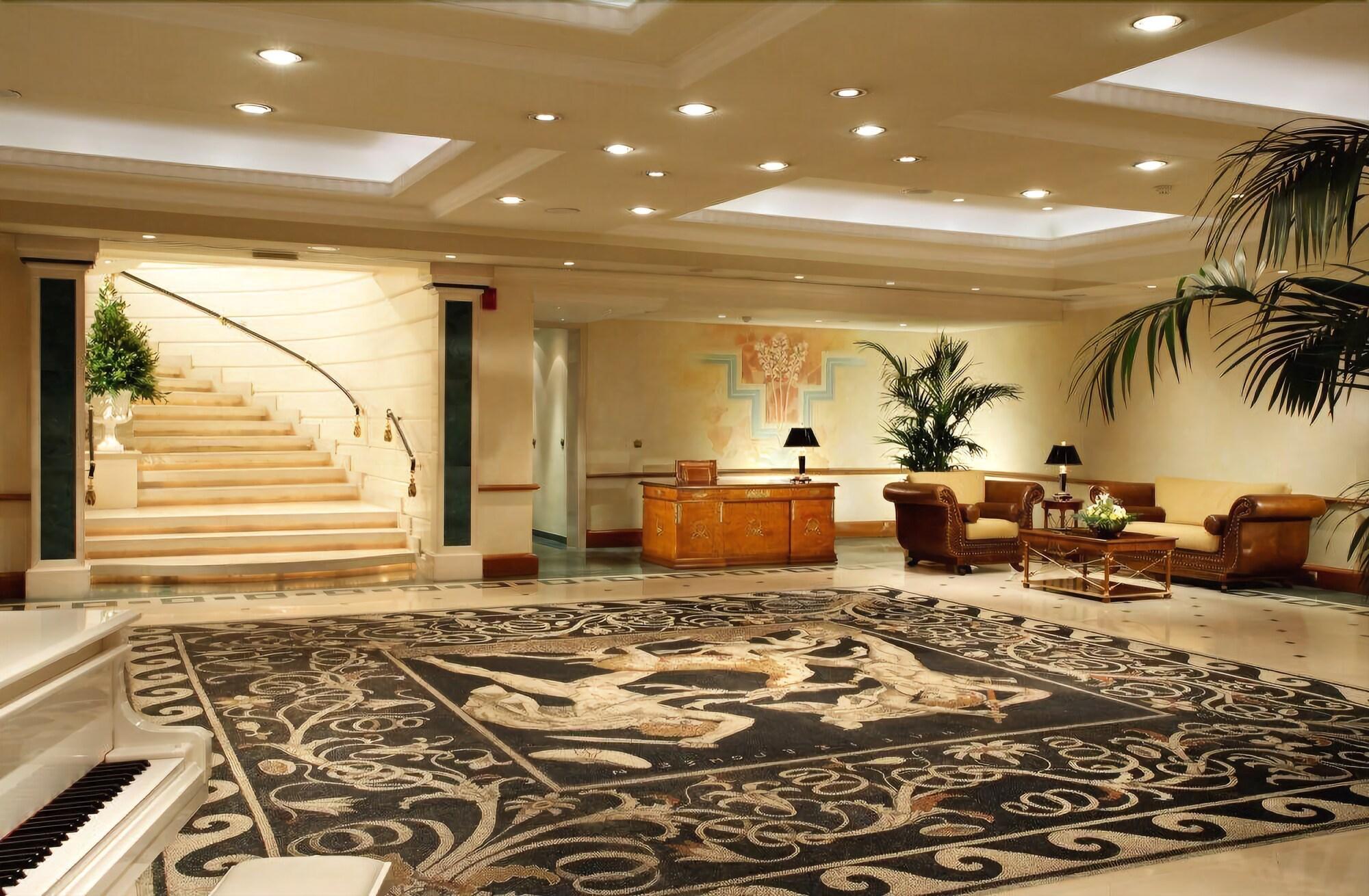 Royal Olympic Hotel Афіни Екстер'єр фото The lobby of the Four Seasons Hotel in Washington, D.C.